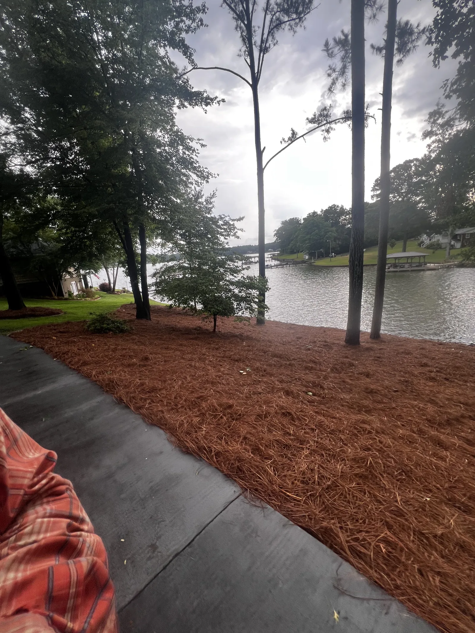 Pine straw installed on a lakeside property